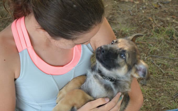 Girl and Fidelco puppy