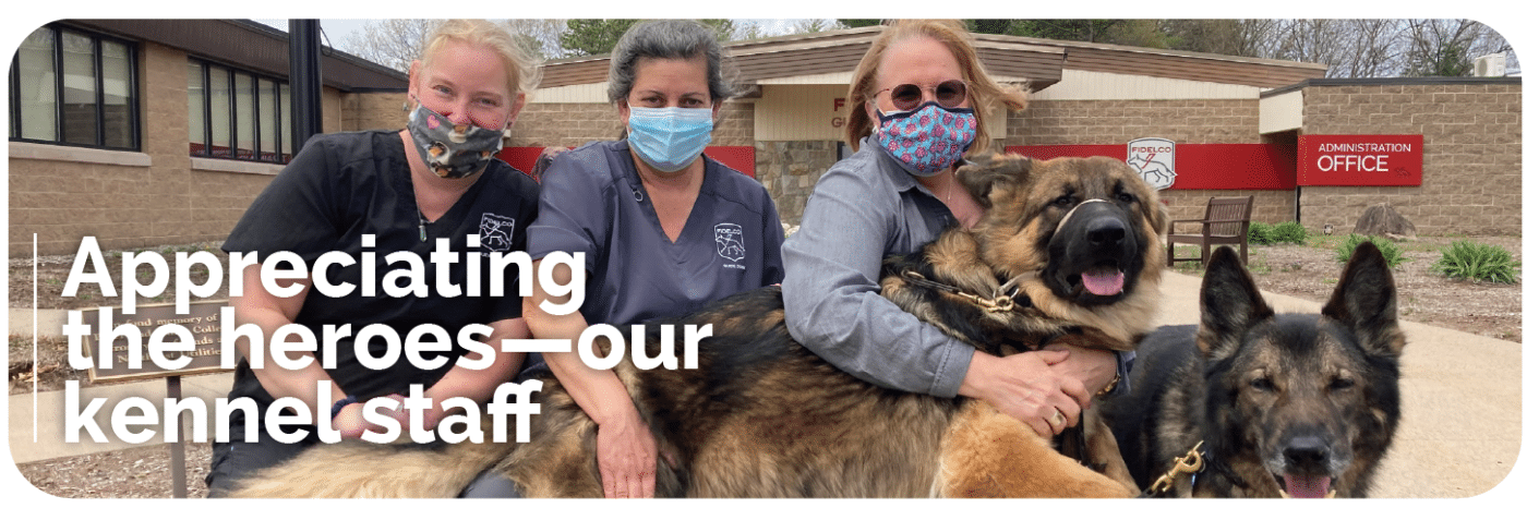 Kennel staff, Jen, Ann, and Lori wearing masks with a guide dog in training across their lap and retired guide at Lori's side with text Appreciating the heroes-our kennel staff over the image.